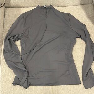 Gray long sleeve fitted blouse with mock neck collar